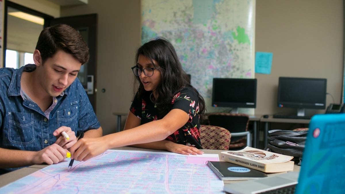 Students examine GIS map